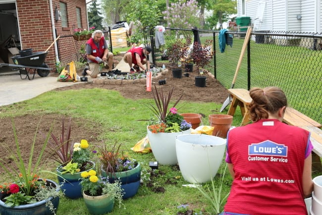 Lowe's volunteers working on the landscaping