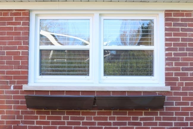 The flower boxes add decor to the home's exterior. 