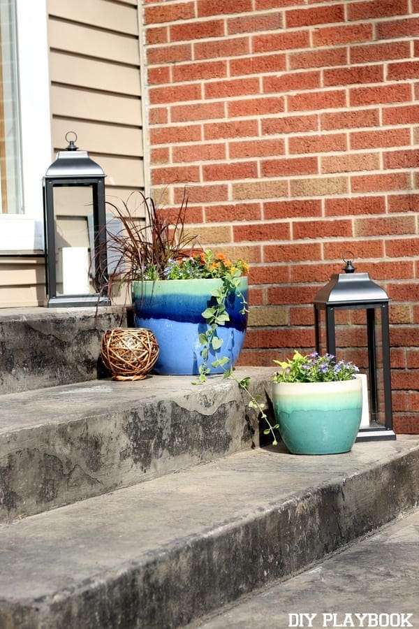 Add lanterns and flower pots to your stairs