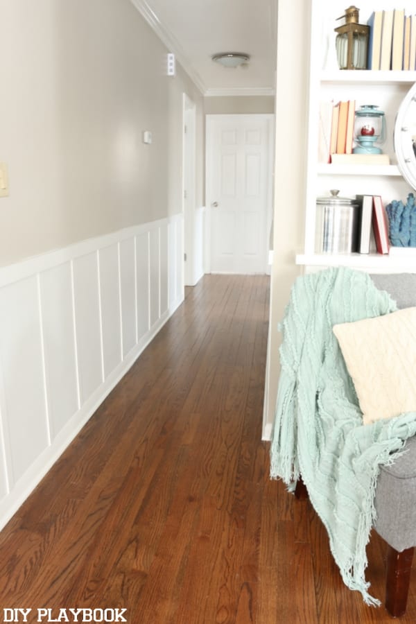 The finished board and batten hallway is a beautiful accent to the home. 