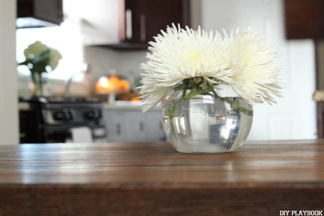 Flowers in a bowl vase look great in any space