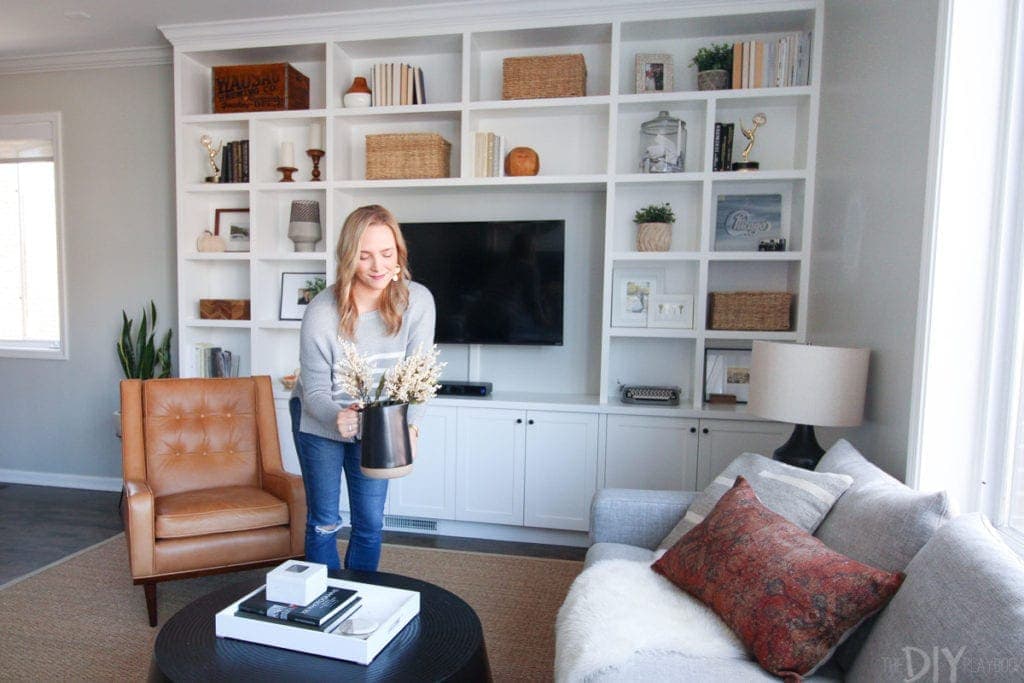 Placing a vase on a coffee table