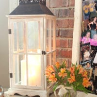 This cute white lantern with a candle adds a rustic element to the bridal shower.