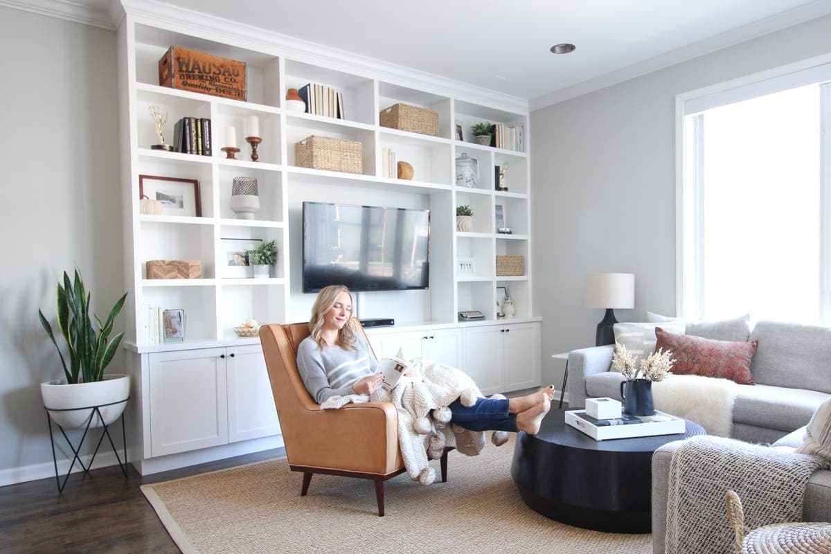 Living room area with white built-ins