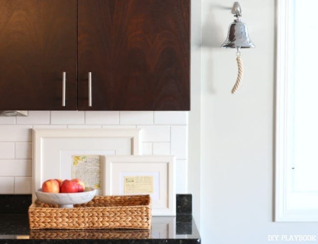 This condo kitchen is modern and sophisticated. 