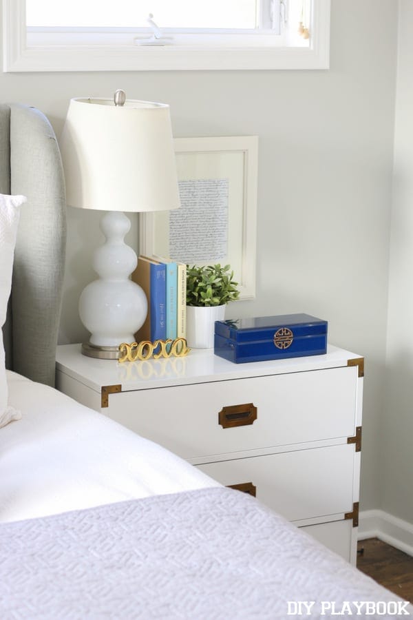 Campaign nightstand with white and blue accents. 