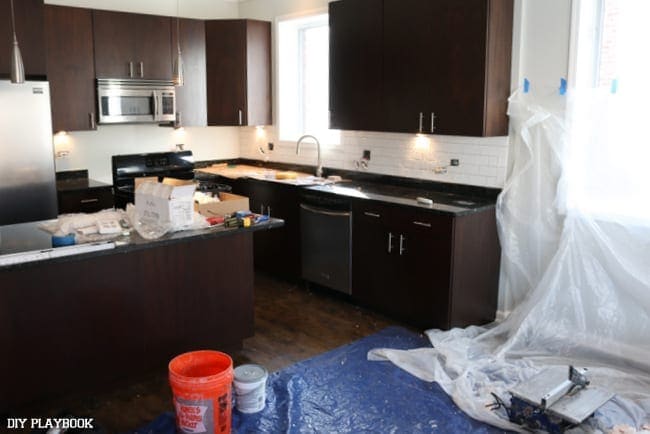 Sometimes projects mean making a mess and this white subway tile backsplash project was no exception! | DIY Playbook