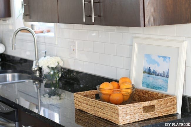 Our kitchen counters and accessories are so much more fun with the tile backsplash!