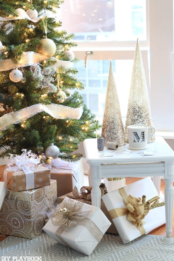 Glamorous Christmas Tree complete with gold ribbon, gold and white ornaments and tons of silver accents!