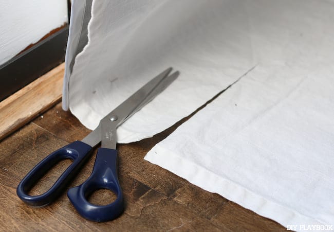 Carefully trim off excess fabric