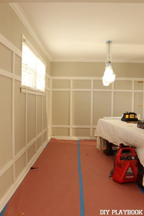 By this time, we've put the board and batten in two other places in the house so we are almost pros! It moved pretty quickly putting up the boards in the dining room.