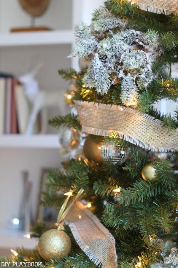 We love this gold burlap ribbon we used to wrap all the way around the tree. 