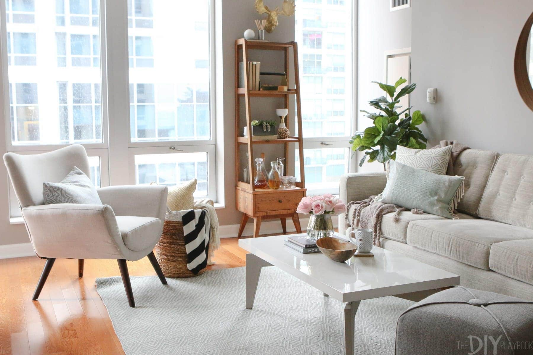 We styled the living room in our friend Maggie's condo. Here's how her designs turned out.