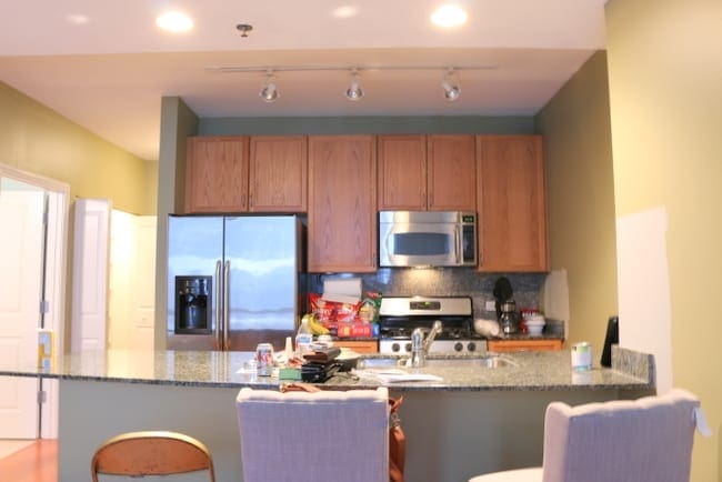 This kitchen area has lots of cabinet space and nice counter tops. 