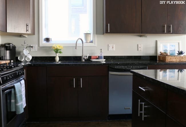 This is our sink area before the white subway tile backsplash was installed. It looks ok, but with the new tiles it will brighten up!